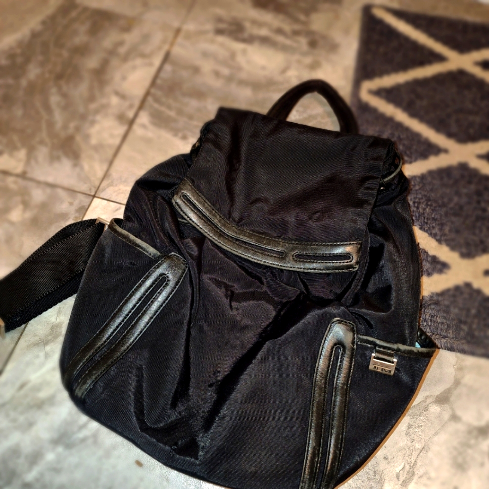 Tumi Black Magnetic Closure Drawstring Leather/Nylon Backpack